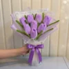 Handmade pipe cleaner flower held in hand